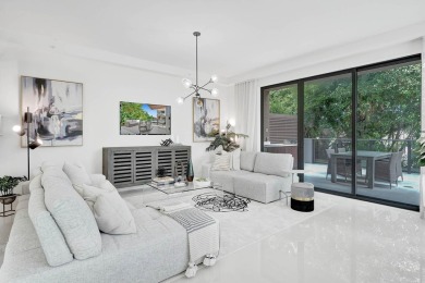 Newer construction-corner 2-story condo w/floor-to-ceiling glass