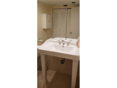 Desirable and spacious 1 bedroom and 1-1/2 bath with golf and