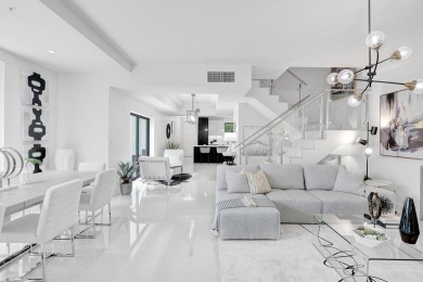 Newer construction-corner 2-story condo w/floor-to-ceiling glass