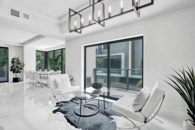 Newer construction-corner 2-story condo w/floor-to-ceiling glass