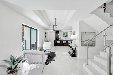 Newer construction-corner 2-story condo w/floor-to-ceiling glass