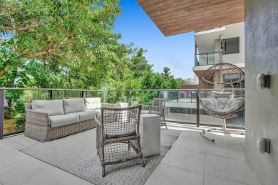 Newer construction-corner 2-story condo w/floor-to-ceiling glass