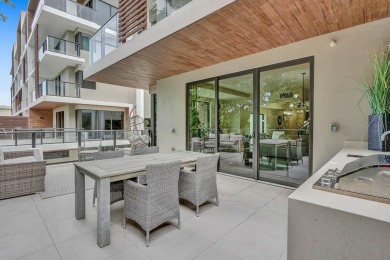 Newer construction-corner 2-story condo w/floor-to-ceiling glass