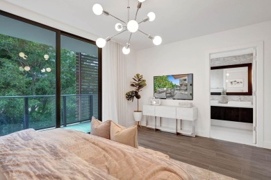 Newer construction-corner 2-story condo w/floor-to-ceiling glass