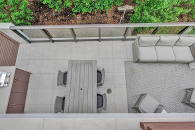 Newer construction-corner 2-story condo w/floor-to-ceiling glass