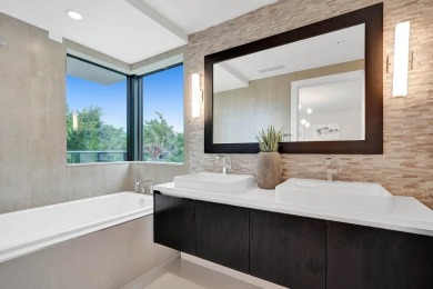 Newer construction-corner 2-story condo w/floor-to-ceiling glass