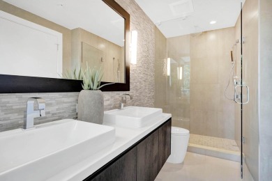 Newer construction-corner 2-story condo w/floor-to-ceiling glass