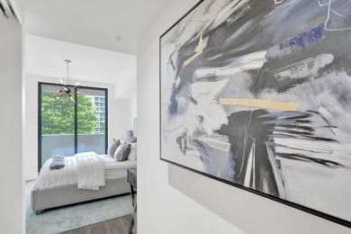 Newer construction-corner 2-story condo w/floor-to-ceiling glass