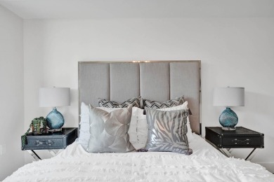 Newer construction-corner 2-story condo w/floor-to-ceiling glass