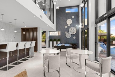 Newer construction-corner 2-story condo w/floor-to-ceiling glass