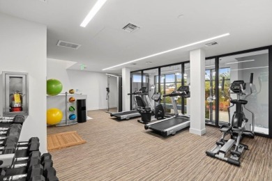 Newer construction-corner 2-story condo w/floor-to-ceiling glass