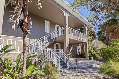 LOOK NO FURTHER FOR A BEAUTIFUL KEY-WEST STYLE HOME IN THE