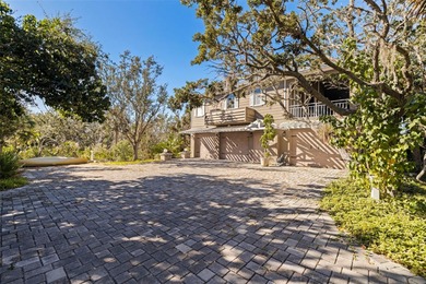 LOOK NO FURTHER FOR A BEAUTIFUL KEY-WEST STYLE HOME IN THE