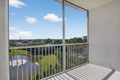 TOP floor CORNER Penthouse w/PRIVATE GARAGE & miles of VIEWS at