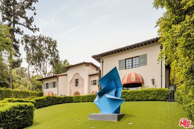 An Estate Fit for a Titan of Industry. Set high above the street