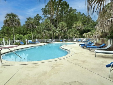 This 2-bedroom, 2-bath condo in The Florida Club blends comfort