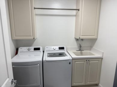 Welcome to your dream penthouse condominium in this peaceful