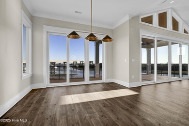 Welcome to your dream waterfront oasis! Built by Channel Marker