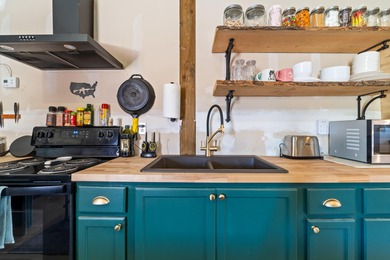 Escape to 40+ acres of private paradise with breathtaking views