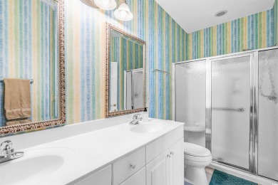 Beautifully updated and meticulously maintained, this top floor