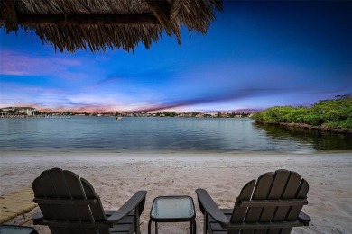 Welcome to your coastal retreat in the sought-after Mariners Cay