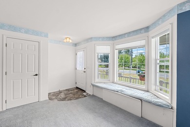 Sitting on the cov. deck, drinking a cup of coffee, watching the