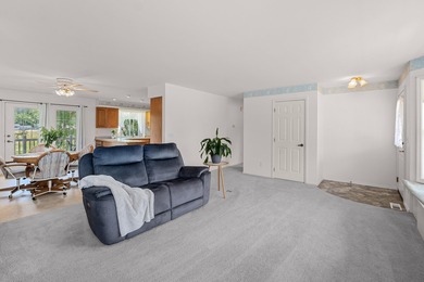 Sitting on the cov. deck, drinking a cup of coffee, watching the