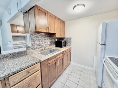 Impeccable 2BR/1BA condo in a desirable 55+ community! Updated