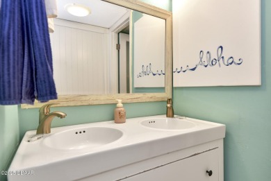 Discover a breathtaking beachfront retreat. This stunning corner