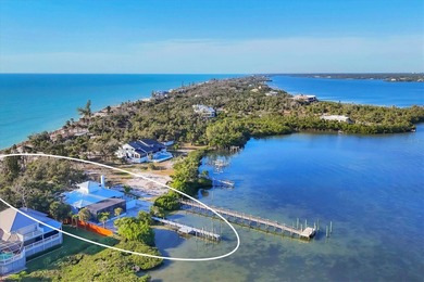 MANASOTA KEY GEM: INTRACOASTAL WATERFRONT WITH DEEDED BEACH