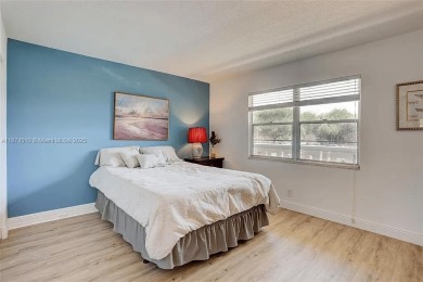 Enjoy resort-style living in Wynmoor's sought-after Antigua I