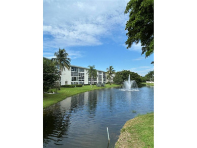 Enjoy resort-style living in Wynmoor's sought-after Antigua I