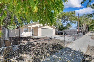 Welcome to this charming single story Hemet home with great