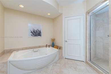 Experience exceptional island living from this exquisite