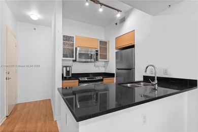 Experience modern city living in this stylish 1-bedroom condo