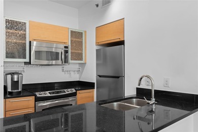 Experience modern city living in this stylish 1-bedroom condo