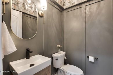 Nestled in the prestigious WindRiver gated lake and golf