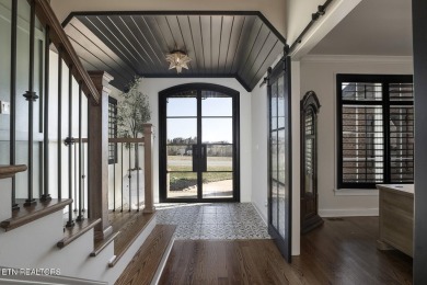 Nestled in the prestigious WindRiver gated lake and golf