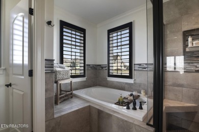 Nestled in the prestigious WindRiver gated lake and golf