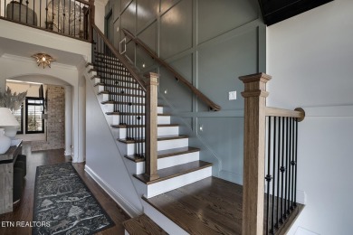 Nestled in the prestigious WindRiver gated lake and golf