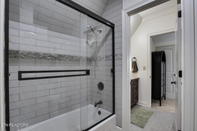 Nestled in the prestigious WindRiver gated lake and golf