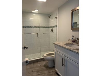 Elegantly and tastefully renovated condo featuring North Eastern