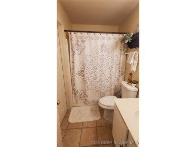 Unit 243A is a stunning lakefront condo on the 4th floor, with