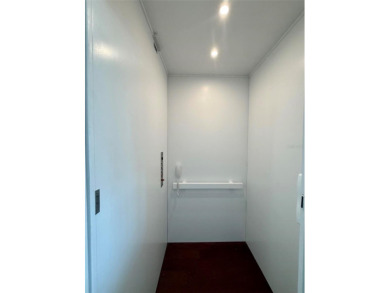 This exquisite custom waterfront residence features four