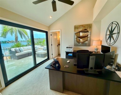 This exquisite custom waterfront residence features four