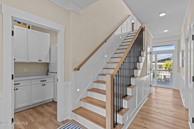 Experience the pinnacle of refined living in this newly