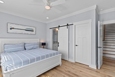 Experience the pinnacle of refined living in this newly