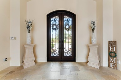 Enjoy the elegance of this custom, over 9,000 square ft estate