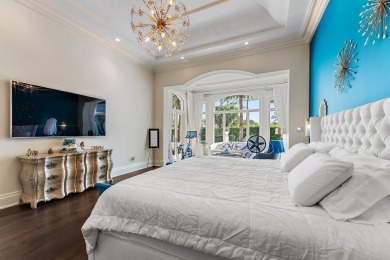 Enjoy the elegance of this custom, over 9,000 square ft estate