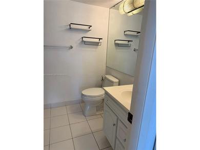 Beautiful lakefront first-floor condo in a desirable 5-story